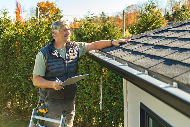 Professional Emergency Roof Repair technician working in Wilmington, MA